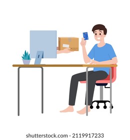 A happy customer sits at his desk holding a credit card and there is a hand appearing from a computer screen on his desk to deliver a parcel box. An online shopping idea on the Internet world.