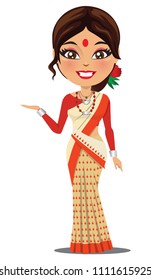 A happy and cute Indian woman wearing a traditional saree from the state of Assam in North East India