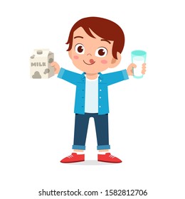 happy cute kid boy drink fresh milk