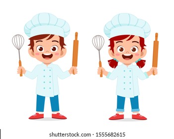 happy cute kid boy and girl in chef costume