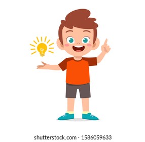 happy cute kid boy holding lamp idea