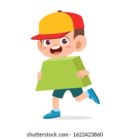 happy cute kid boy holding shape trapezium