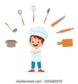 happy cute kid boy ins chef costume