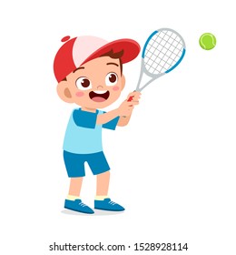 happy cute kid boy play train tennis