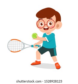 happy cute kid boy play train tennis