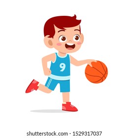 happy cute kid boy play basketball