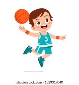 happy cute kid boy play basketball