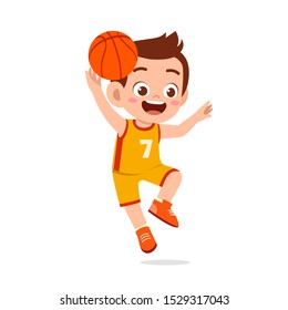 happy cute kid boy play basketball