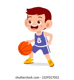 happy cute kid boy play basketball