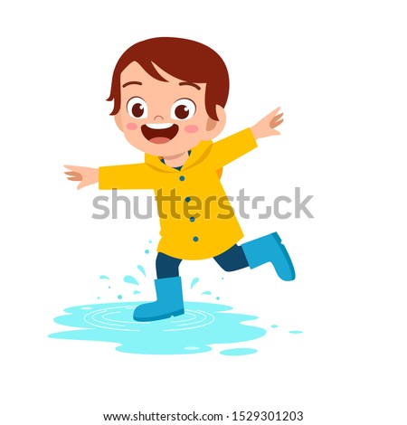 happy cute kid boy play wear raincoat