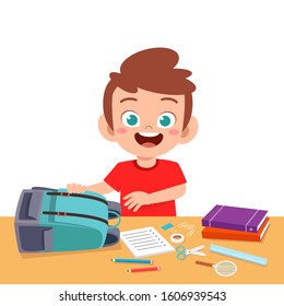 happy cute kid boy prepare bag for school