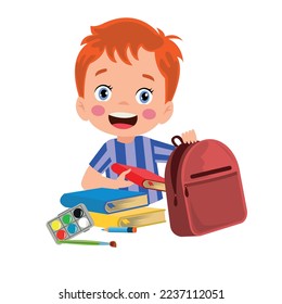 happy cute kid boy prepare bag for school