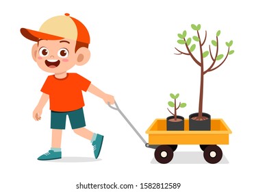 Happy Cute Kid Boy Pull Wagon With Tree