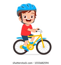 happy cute kid boy riding bike smile