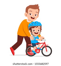 happy cute kid boy riding bike with dad