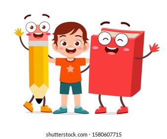 happy cute kid boy stand with book and pencil