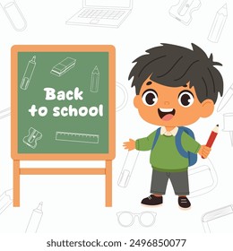 Happy cute kid boy standing near chalkboard. Preschool pupil
