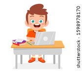 happy cute kid boy study using new laptop