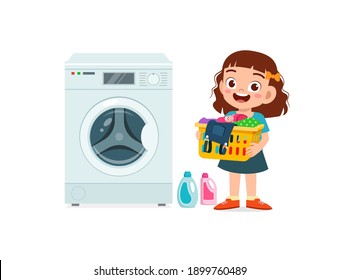 happy cute kid do laundry with washing machine