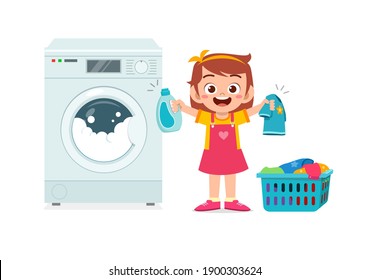 happy cute kid do laundry with washing machine