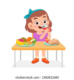 happy cute kid girl eat healthy food