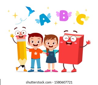 happy cute kids boy and girl with book and pencil