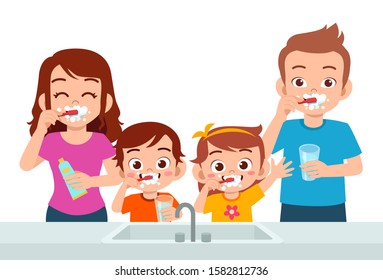 happy cute kids boy and girl brush teeth with parent