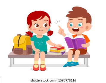 happy cute kids boy and girl read book together