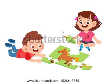 happy cute kids play solve puzzle together