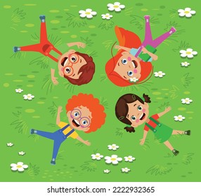 happy cute kids smiling lying down on grass