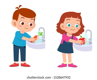 happy cute kids wash vegetable fruit clean