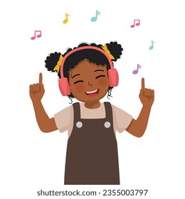 Feliz linda niña africana escuchando música con auriculares