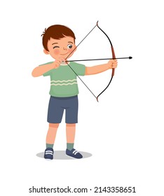 happy cute little boy with bow and arrow doing archery sport aiming ready to shoot