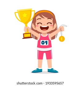 happy cute little girl holding gold medal and trophy