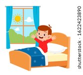 happy cute little kid boy wake up in the morning