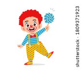 happy cute little kid boy and girl celebrate Halloween wears clown costume