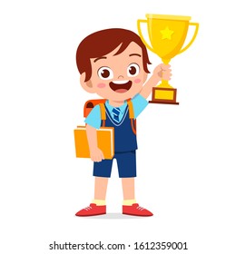happy cute little kid boy holding trophy