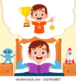 happy cute little kid boy read book and dreaming