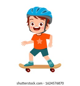 happy cute little kid boy play skateboard