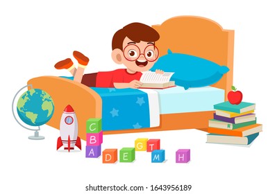 happy cute little kid boy use tablet in room