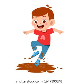 happy cute little kid boy jump on mud