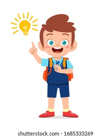 happy cute little kid boy with light idea