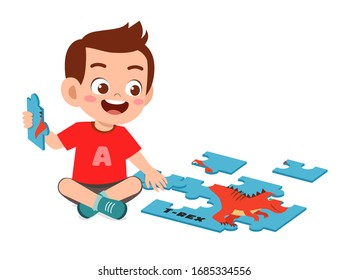 happy cute little kid boy play jigsaw puzzle