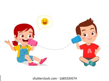 Happy Cute Little Kid Boy And Girl Play Toy Phone