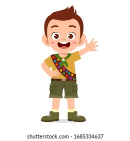 happy cute little kid boy wear scout uniform