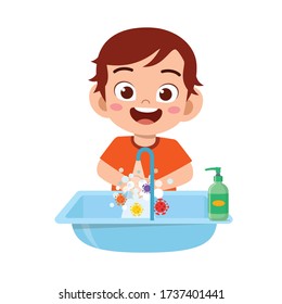 happy cute little kid boy wash hand in sink