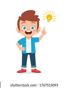 happy cute little kid boy with idea lamp sign