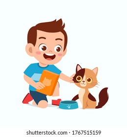 happy cute little kid boy play with pet cat