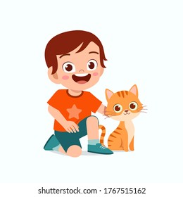 happy cute little kid boy play with pet cat