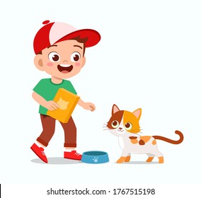 happy cute little kid boy play with pet cat